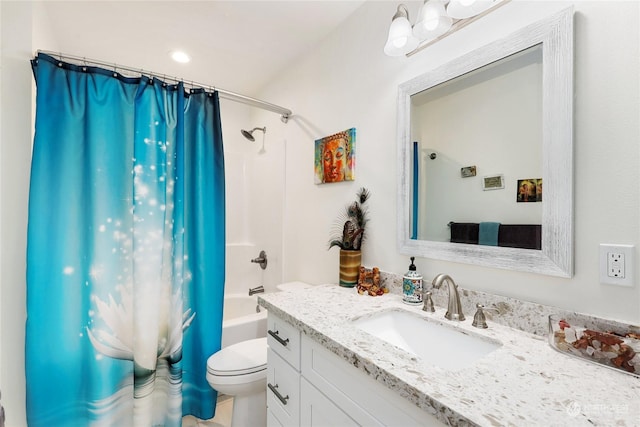 full bathroom with vanity, shower / bathtub combination with curtain, and toilet