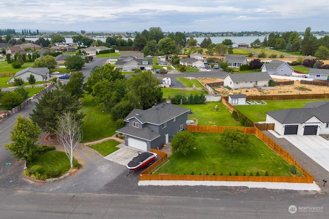 drone / aerial view with a water view