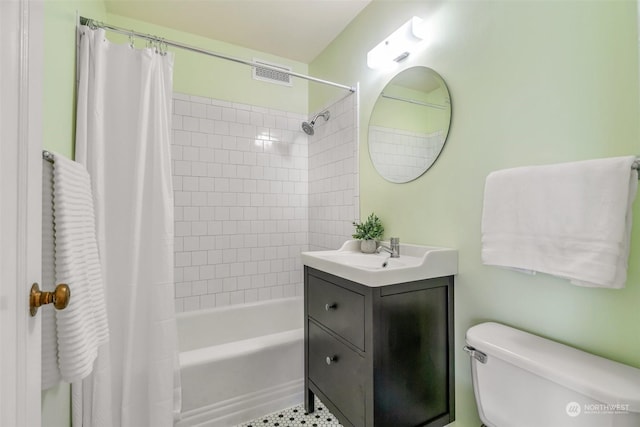 full bathroom with vanity, shower / bathtub combination with curtain, and toilet