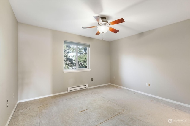 carpeted spare room featuring a baseboard radiator and ceiling fan