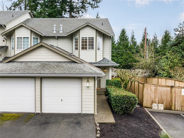 front of property with a garage