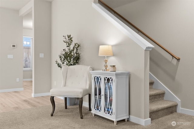 living area with hardwood / wood-style flooring