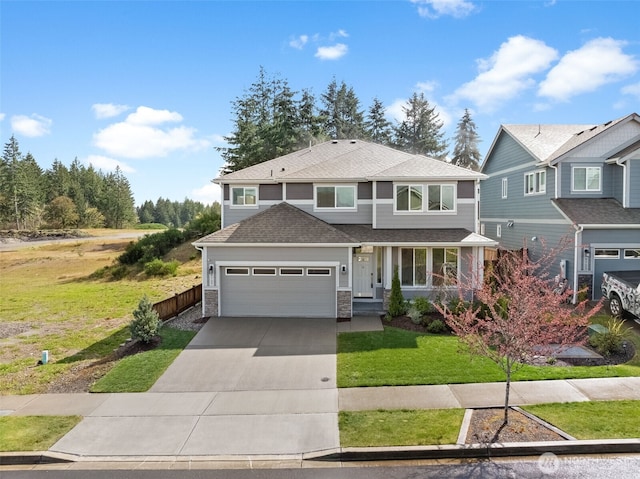 view of front of house with stone siding, concrete driveway, a garage, a front lawn, and a shingled roof