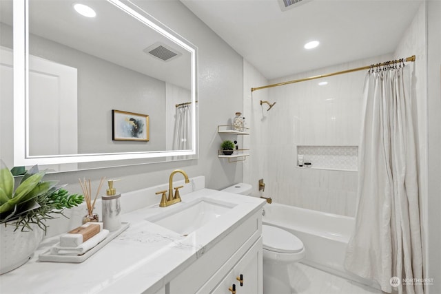 full bathroom featuring shower / tub combo with curtain, vanity, and toilet