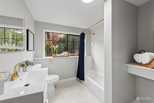 full bathroom with shower / bath combination with curtain, tile patterned floors, vanity, and toilet