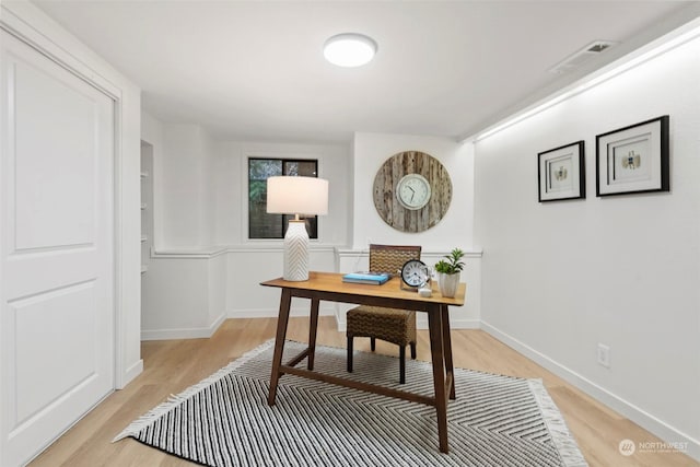 office space featuring light wood-type flooring