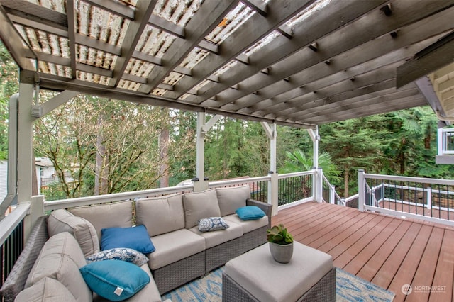 wooden terrace with an outdoor living space and a pergola