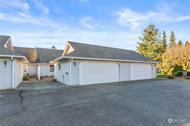 exterior space with a garage