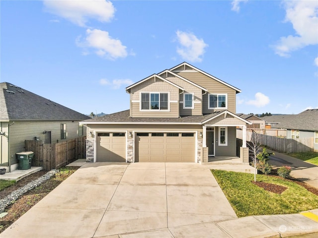 craftsman inspired home with a garage