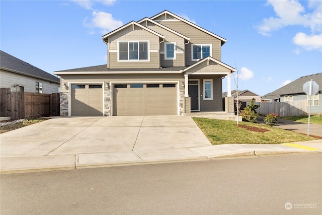 craftsman inspired home with a garage