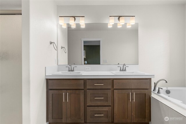 bathroom with vanity and a tub to relax in