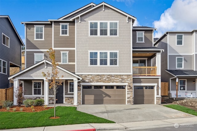 view of front of home with a garage and a front yard