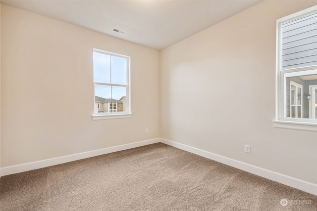 unfurnished room with carpet