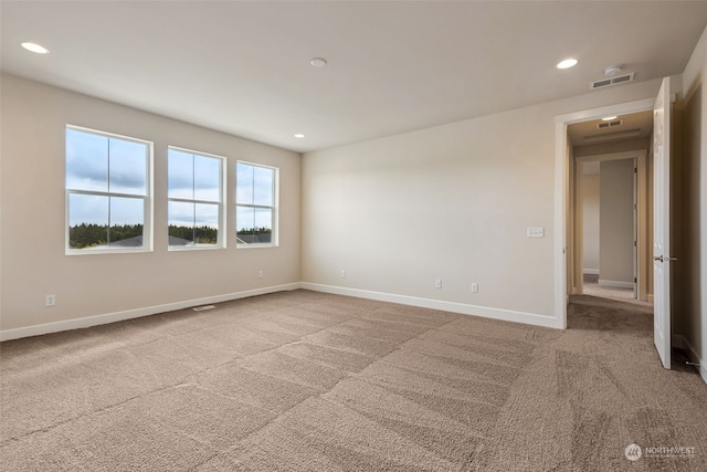 view of carpeted spare room