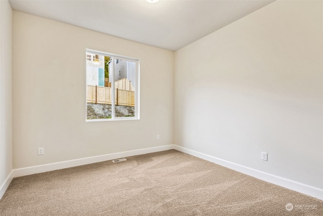 spare room with carpet flooring