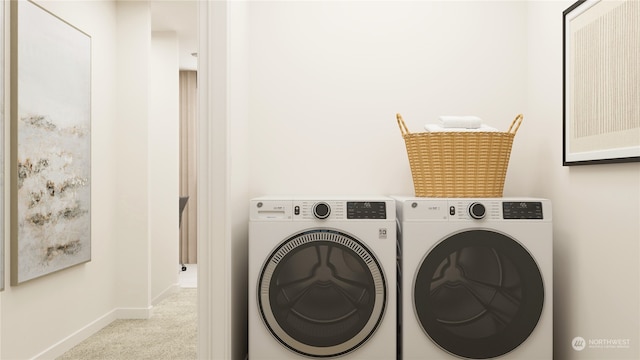 laundry room featuring light colored carpet and washing machine and clothes dryer