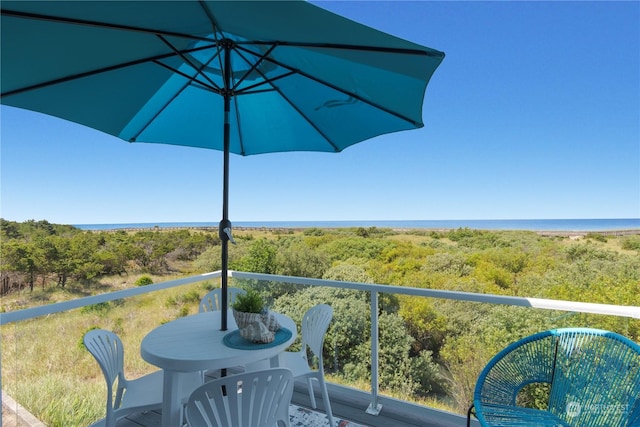 balcony featuring a water view