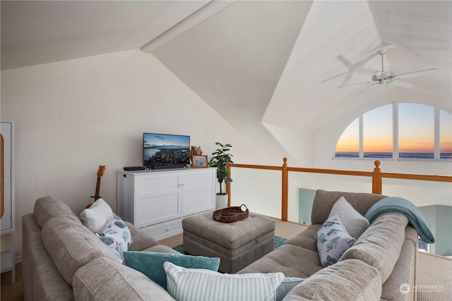 living room featuring lofted ceiling with beams and ceiling fan