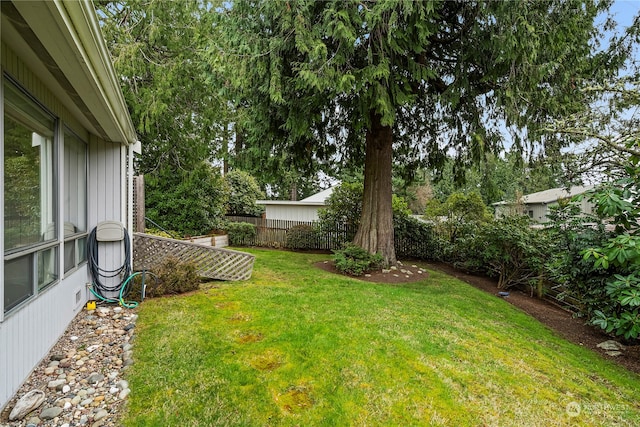 view of yard with fence