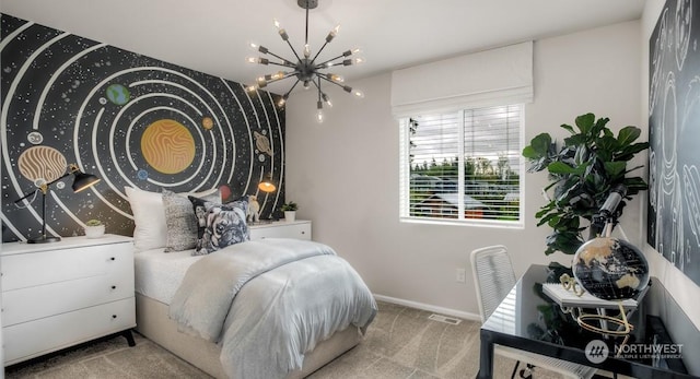 bedroom featuring light colored carpet and a chandelier