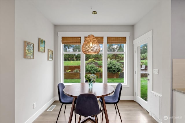 dining room featuring light wood-type flooring