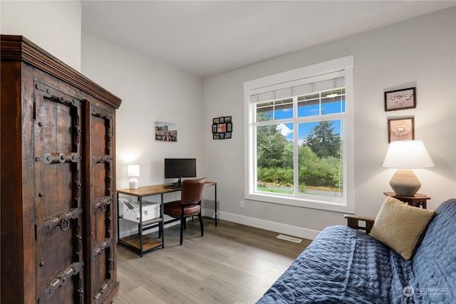 home office featuring light hardwood / wood-style flooring