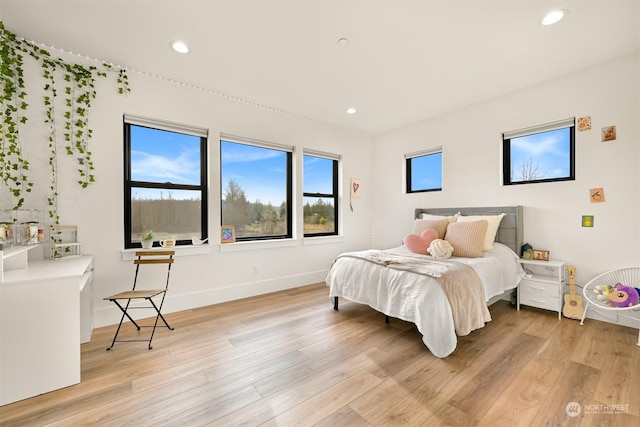 bedroom featuring light wood-type flooring