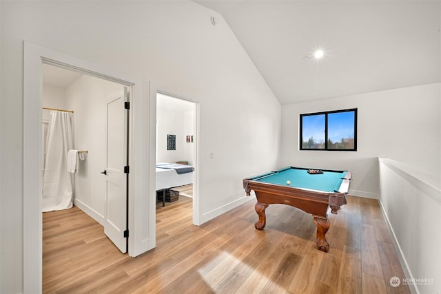 playroom featuring billiards, high vaulted ceiling, and light hardwood / wood-style floors