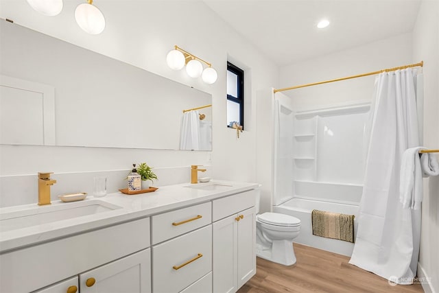 full bathroom with shower / bath combination with curtain, vanity, toilet, and hardwood / wood-style floors