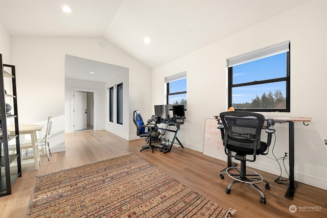 office area with lofted ceiling and light hardwood / wood-style floors