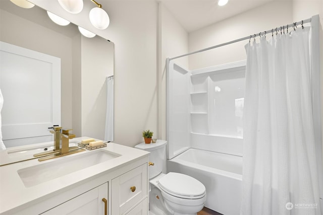 full bathroom with vanity, toilet, and shower / bath combo