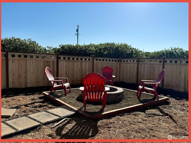 view of patio featuring an outdoor fire pit