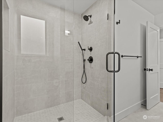 bathroom featuring a shower stall