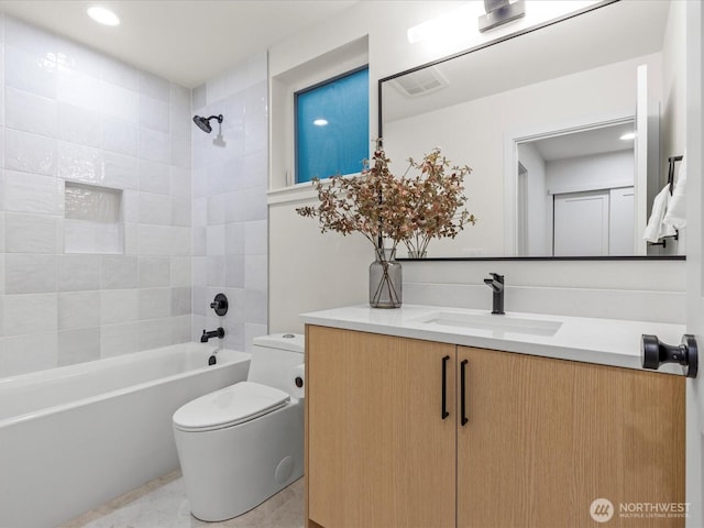 bathroom with visible vents, shower / bathtub combination, toilet, and vanity