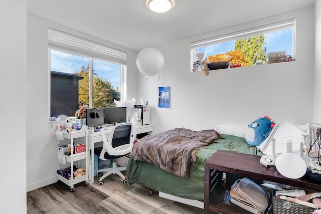 bedroom featuring hardwood / wood-style floors