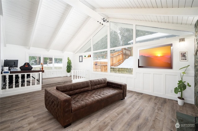 interior space with lofted ceiling with beams