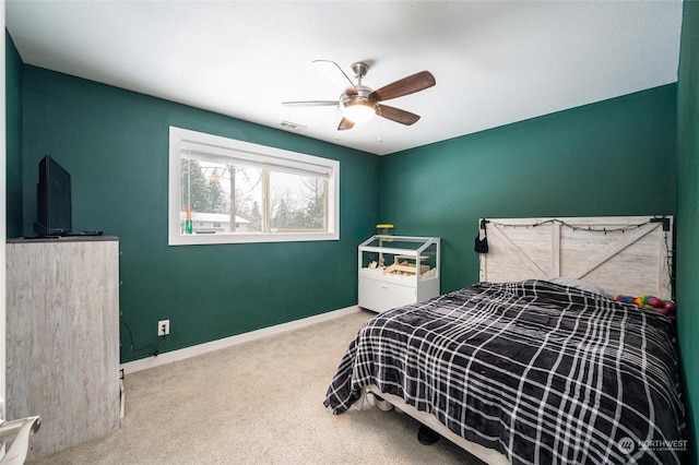 bedroom featuring ceiling fan and carpet flooring