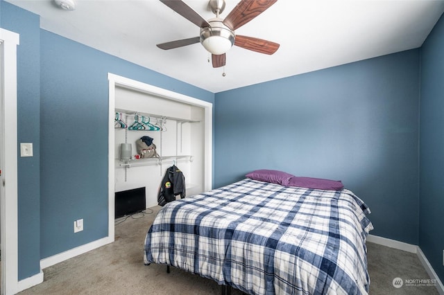 bedroom with a closet, ceiling fan, and carpet flooring