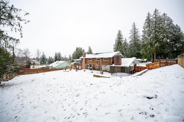 view of yard covered in snow