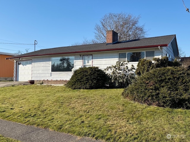 2804 M Ave, Anacortes, WA 98221 - view of home's exterior featuring a garage and a lawn