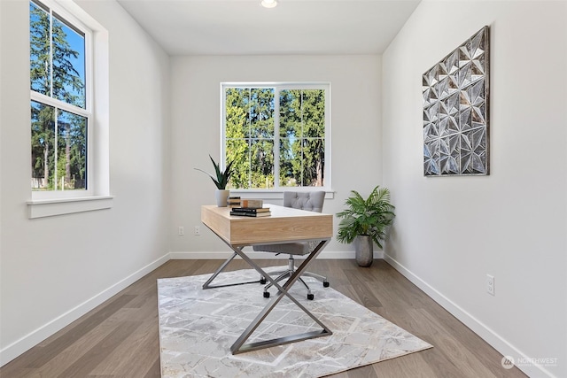 office area with hardwood / wood-style flooring