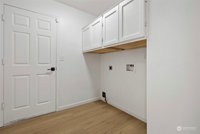 laundry room featuring cabinets, hookup for a washing machine, hookup for an electric dryer, and light wood-type flooring