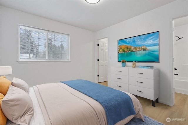 bedroom featuring light hardwood / wood-style flooring