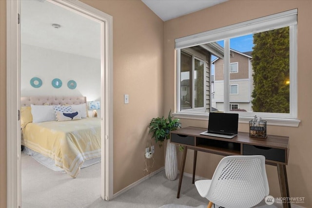 home office featuring carpet flooring and baseboards