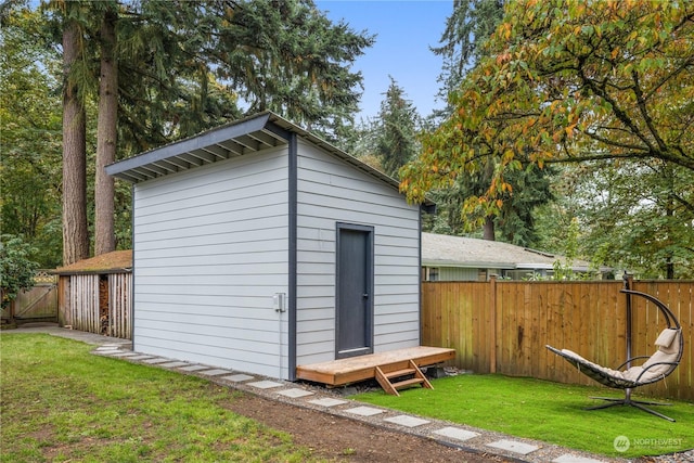 view of outdoor structure with a yard