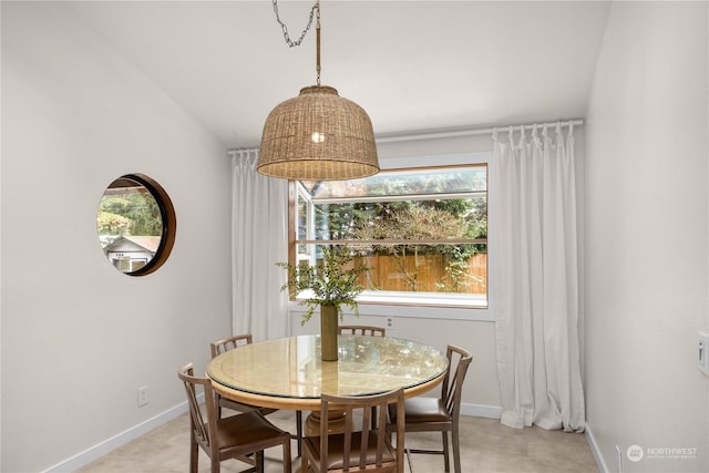 view of carpeted dining space