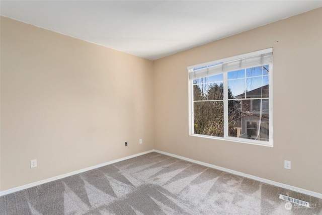 view of carpeted spare room