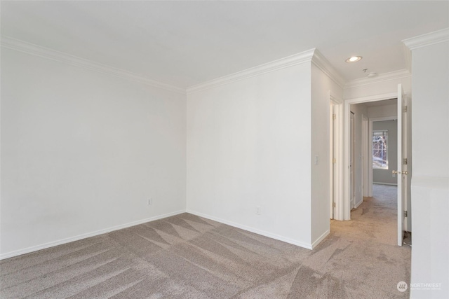 empty room with light colored carpet and ornamental molding