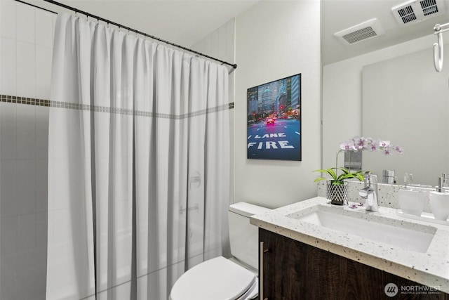 4407 42nd Ave SW Unit D, Seattle, WA 98116 - bathroom featuring vanity, a shower with shower curtain, toilet, and visible vents