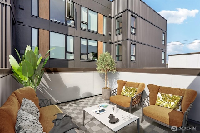 4407 42nd Ave SW Unit D, Seattle, WA 98116 - balcony featuring outdoor lounge area and a patio area